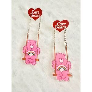Light pink with rainbow care bear dangle earrings